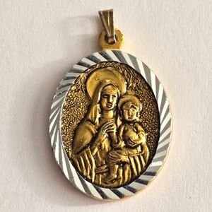 Vintage Our Lady of Maryknoll Christian Mixed Metal Silver And Gold Tone Pendant